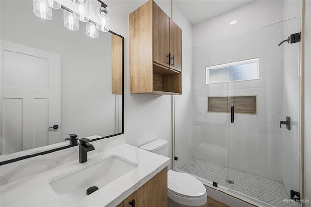 2413 N Woody St, Edinburg, TX 78541 - bathroom featuring a shower stall and vanity