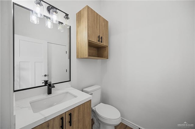 2413 N Woody St, Edinburg, TX 78541 - bathroom with vanity and wood finished floors