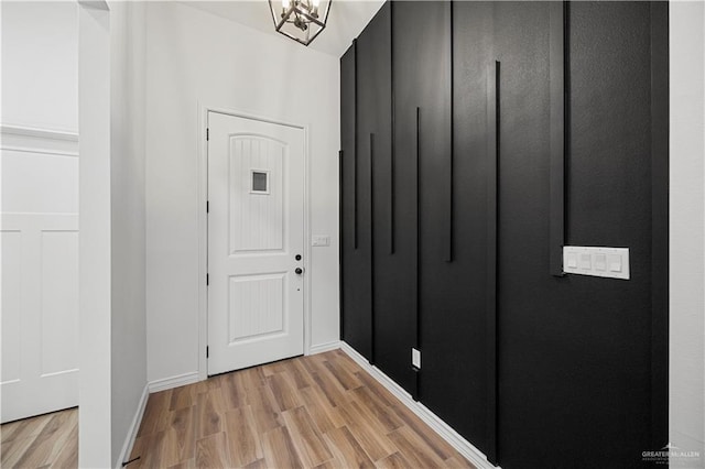 2413 N Woody St, Edinburg, TX 78541 - entrance foyer featuring light wood-style flooring and baseboards