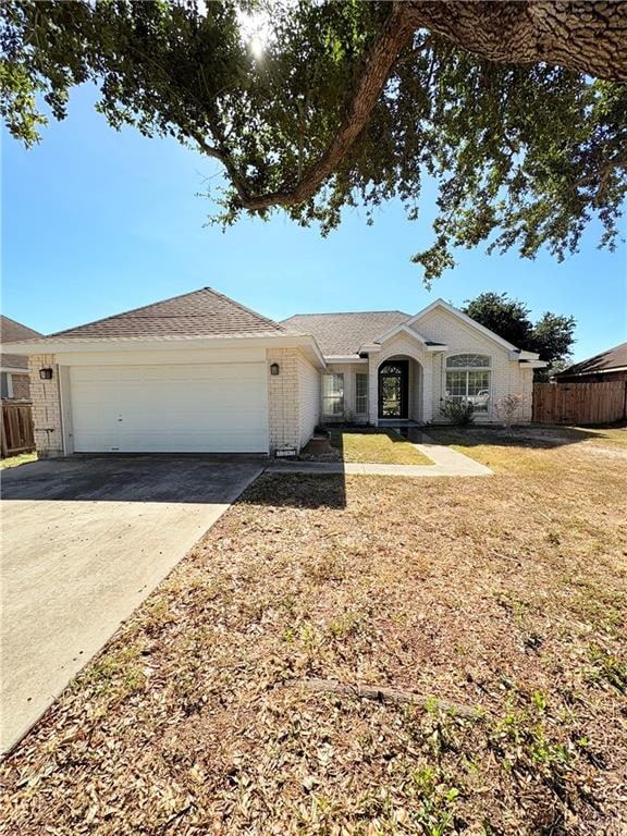 ranch-style home with a garage