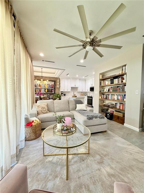 1925 Sunset Dr, Mission, TX 78572 - living room with a ceiling fan, recessed lighting, and baseboards