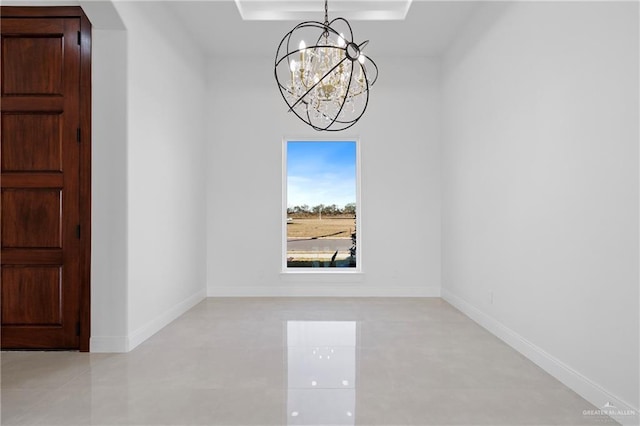 unfurnished dining area featuring a raised ceiling, light tile patterned floors, and a notable chandelier