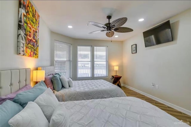 200 Padre Blvd Unit 2102, South Padre Island, TX 78597 - bedroom featuring recessed lighting, baseboards, wood finished floors, and ceiling fan