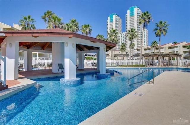 200 Padre Blvd Unit 2102, South Padre Island, TX 78597 - community pool featuring a gazebo, a patio, and fence