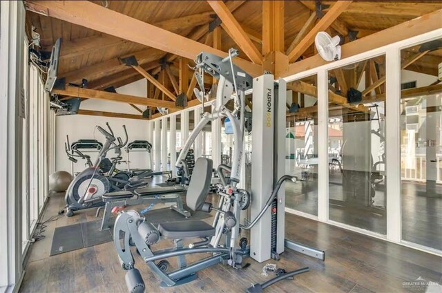 200 Padre Blvd Unit 2102, South Padre Island, TX 78597 - workout area with vaulted ceiling and wood finished floors