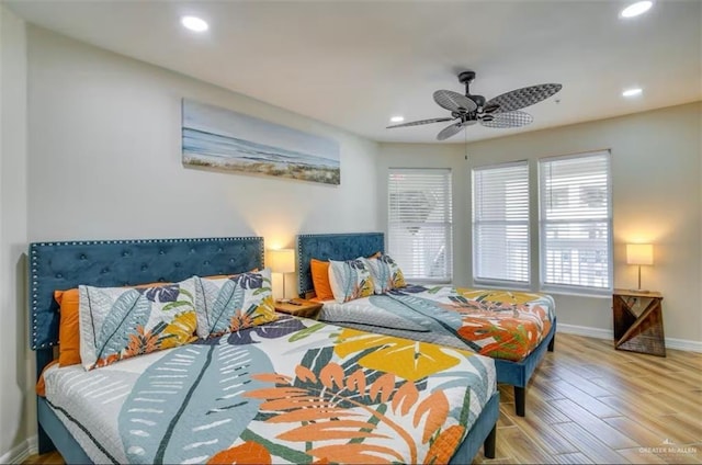 200 Padre Blvd Unit 2102, South Padre Island, TX 78597 - bedroom with recessed lighting, baseboards, and wood finished floors