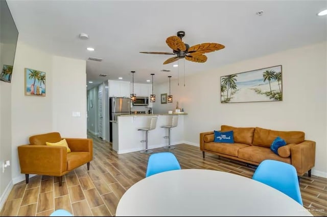 200 Padre Blvd Unit 2102, South Padre Island, TX 78597 - living room with recessed lighting, baseboards, ceiling fan, and wood tiled floor