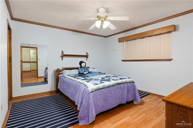 501 Capricorn St, Mission, TX 78572 - bedroom with ceiling fan, wood finished floors, baseboards, and ornamental molding