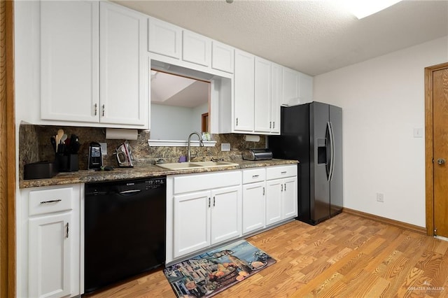 501 Capricorn St, Mission, TX 78572 - kitchen featuring a sink, light wood-type flooring, dishwasher, fridge with ice dispenser, and backsplash