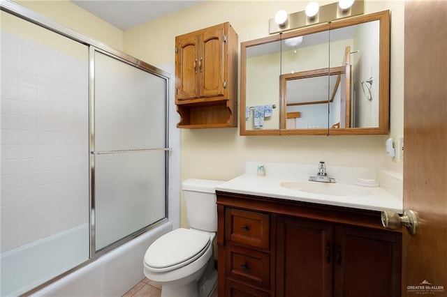 501 Capricorn St, Mission, TX 78572 - bathroom featuring vanity, enclosed tub / shower combo, and toilet