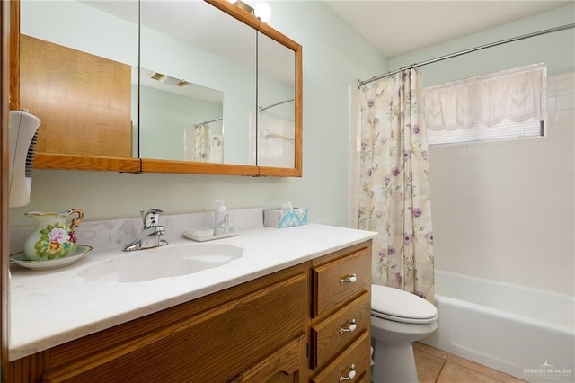 501 Capricorn St, Mission, TX 78572 - bathroom featuring shower / bath combo, tile patterned floors, vanity, and toilet