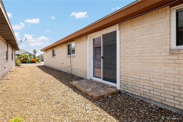 501 Capricorn St, Mission, TX 78572 - view of side of home with brick siding
