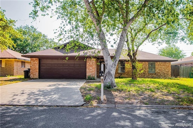 ranch-style home featuring a garage