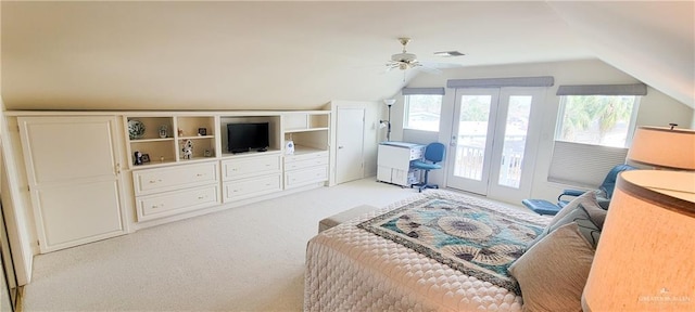 bedroom featuring visible vents, a ceiling fan, light colored carpet, access to outside, and vaulted ceiling