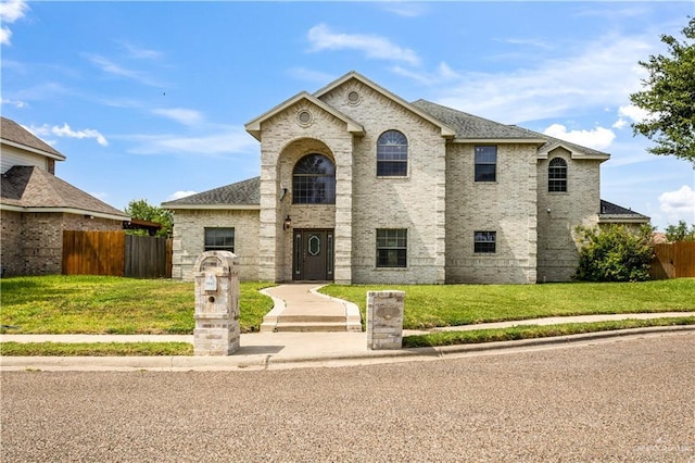 1711 Solar Dr, Mission, TX 78574 - view of front of property with brick siding and roof with shingles