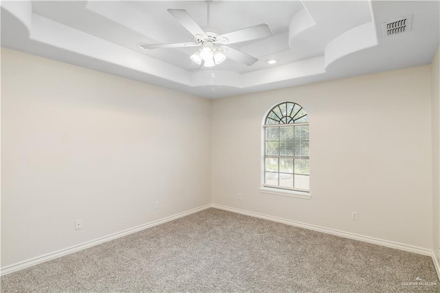 1711 Solar Dr, Mission, TX 78574 - spare room featuring a raised ceiling, carpet, baseboards, a ceiling fan, and recessed lighting