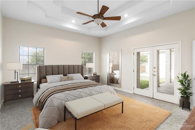 1711 Solar Dr, Mission, TX 78574 - bedroom with access to exterior, french doors, recessed lighting, a tray ceiling, and baseboards