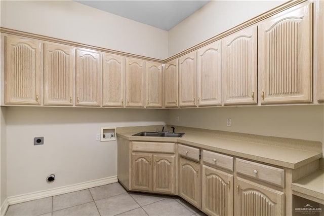 1711 Solar Dr, Mission, TX 78574 - washroom featuring hookup for a washing machine, hookup for an electric dryer, cabinet space, light tile patterned flooring, and baseboards