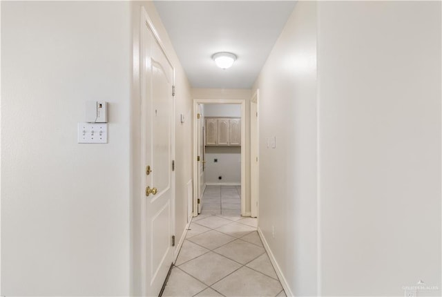 1711 Solar Dr, Mission, TX 78574 - hallway featuring light tile patterned floors and baseboards