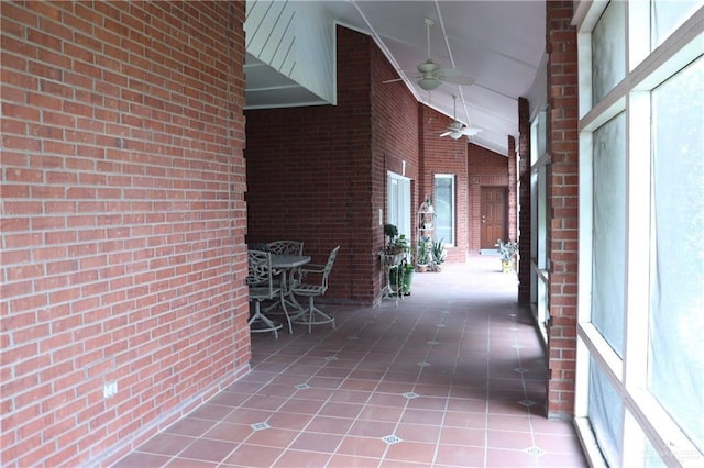 view of patio featuring ceiling fan