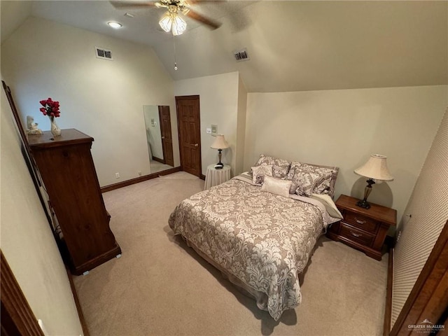 carpeted bedroom featuring vaulted ceiling and ceiling fan