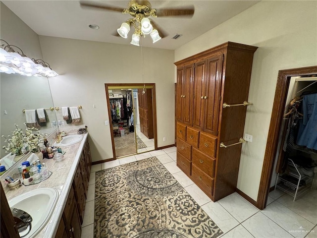 bathroom featuring vanity, tile patterned floors, and ceiling fan