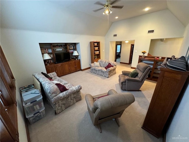 carpeted living room featuring lofted ceiling and ceiling fan