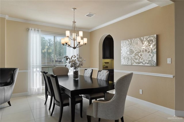 3502 Plantation Grove Blvd, Mission, TX 78572 - dining space with arched walkways, a chandelier, ornamental molding, and light tile patterned floors