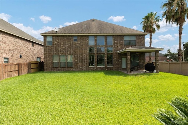 3502 Plantation Grove Blvd, Mission, TX 78572 - back of house with a patio, a fenced backyard, and brick siding