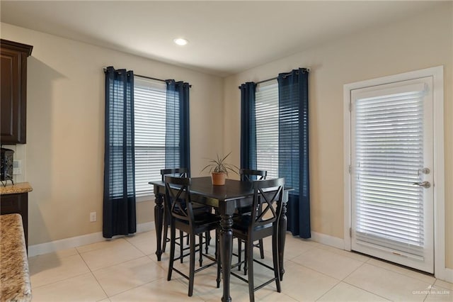 3502 Plantation Grove Blvd, Mission, TX 78572 - dining area with light tile patterned floors and recessed lighting