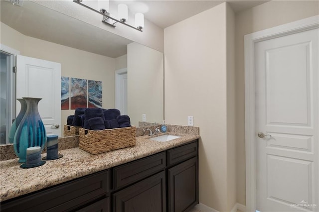 3502 Plantation Grove Blvd, Mission, TX 78572 - bathroom with vanity and baseboards