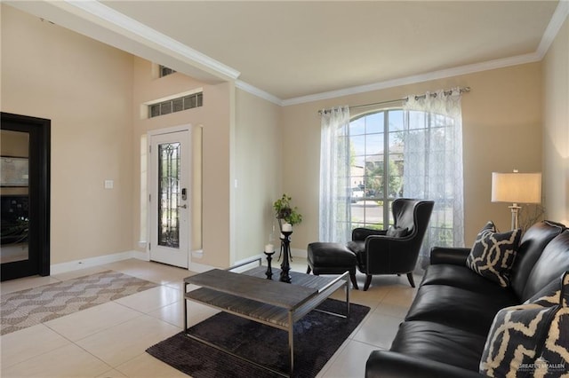 3502 Plantation Grove Blvd, Mission, TX 78572 - living area featuring light tile patterned floors and ornamental molding