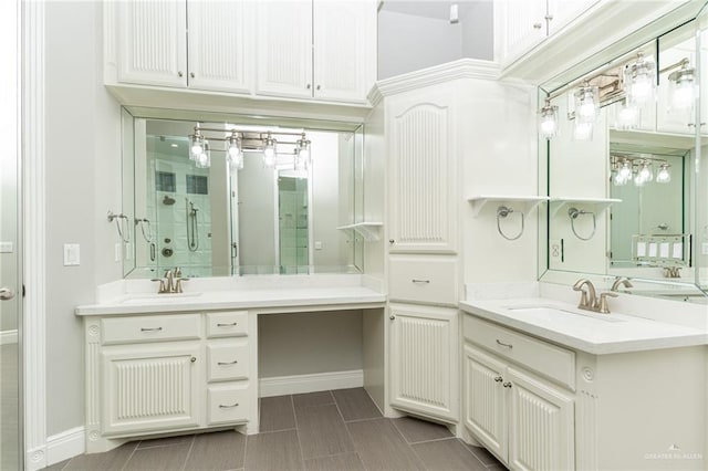 5501 N 8th St, Mcallen, TX 78504 - full bath featuring baseboards, two vanities, and a sink