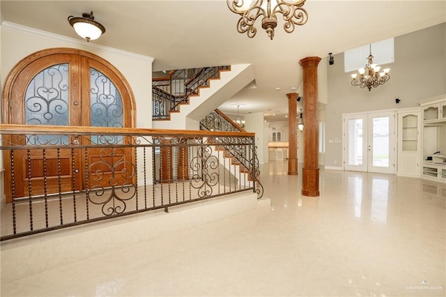 5501 N 8th St, Mcallen, TX 78504 - foyer entrance featuring stairway, a towering ceiling, ornamental molding, french doors, and a notable chandelier