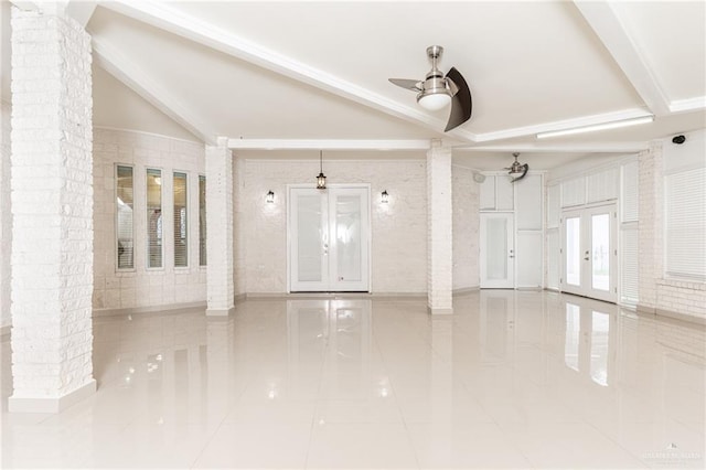5501 N 8th St, Mcallen, TX 78504 - empty room with a ceiling fan, tile patterned floors, lofted ceiling with beams, french doors, and decorative columns