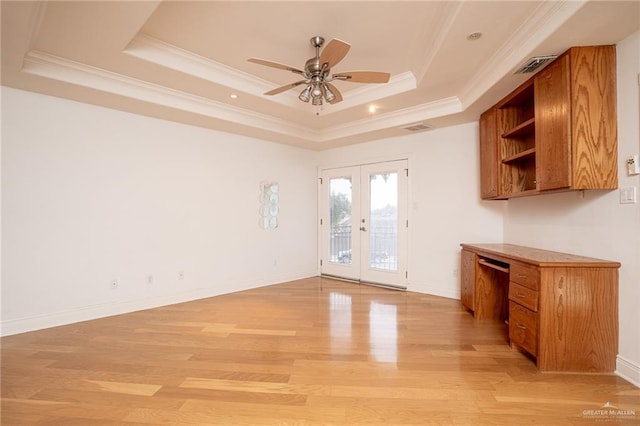 5501 N 8th St, Mcallen, TX 78504 - interior space featuring light wood finished floors, a tray ceiling, ornamental molding, french doors, and ceiling fan