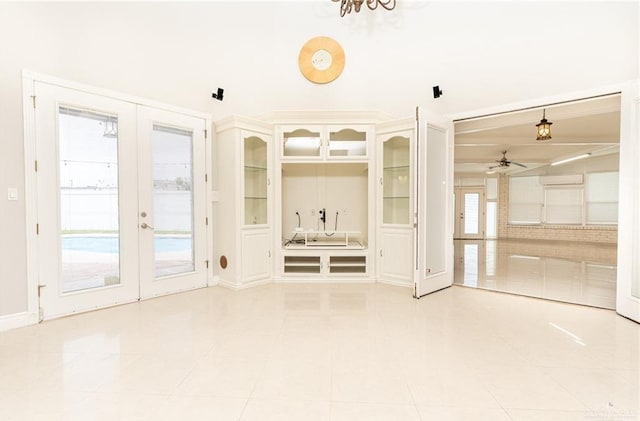 5501 N 8th St, Mcallen, TX 78504 - mudroom featuring light tile patterned flooring, ceiling fan, and french doors
