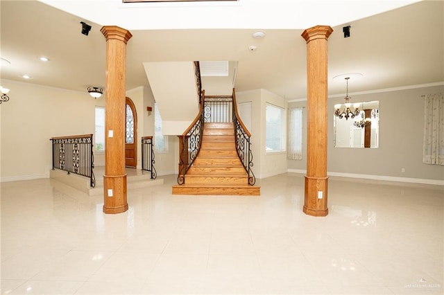 5501 N 8th St, Mcallen, TX 78504 - stairway featuring a chandelier, baseboards, ornamental molding, and decorative columns
