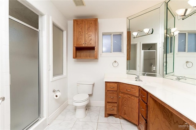 5501 N 8th St, Mcallen, TX 78504 - bathroom featuring toilet, visible vents, marble finish floor, and a stall shower