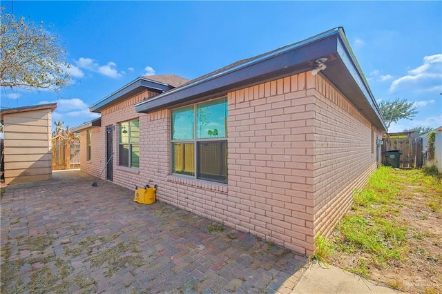 view of home's exterior featuring a patio area