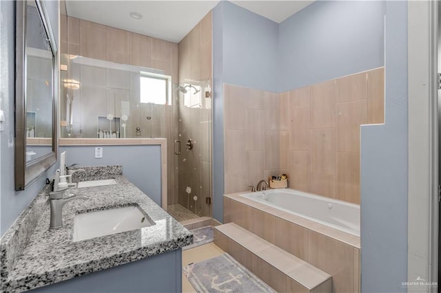 bathroom featuring vanity and plus walk in shower