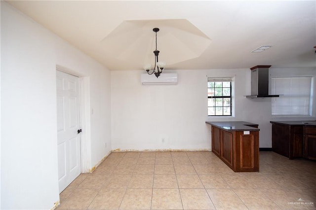 201 E Durango Dr, Pharr, TX 78577 - unfurnished dining area featuring a wall mounted air conditioner, visible vents, and light tile patterned floors