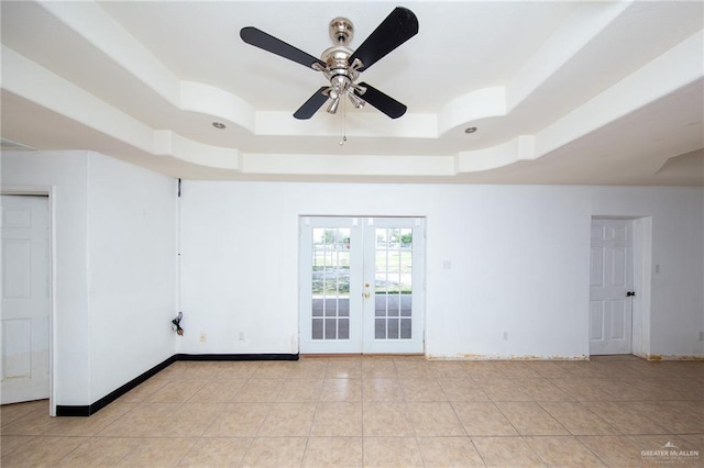 201 E Durango Dr, Pharr, TX 78577 - unfurnished room featuring ceiling fan, french doors, a raised ceiling, and light tile patterned flooring
