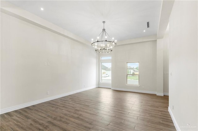 3317 Yellowhammer Ave, Mcallen, TX 78504 - unfurnished room with a chandelier, dark wood finished floors, baseboards, and recessed lighting