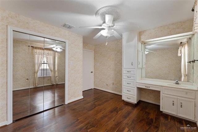 bathroom featuring vanity and wood-type flooring