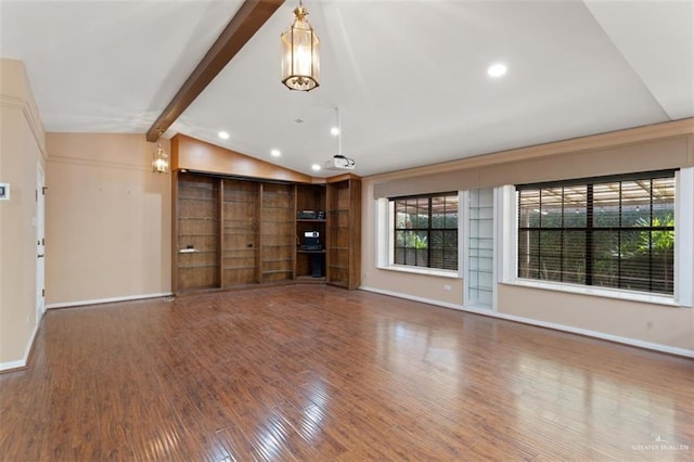 unfurnished living room with lofted ceiling with beams and wood-type flooring