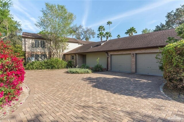 view of front of home with a garage