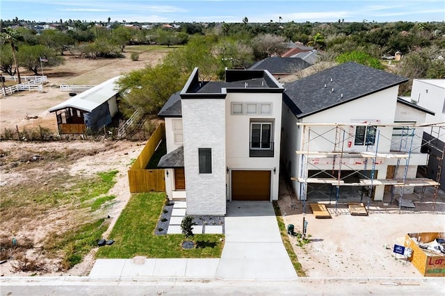 view of front of home with a garage