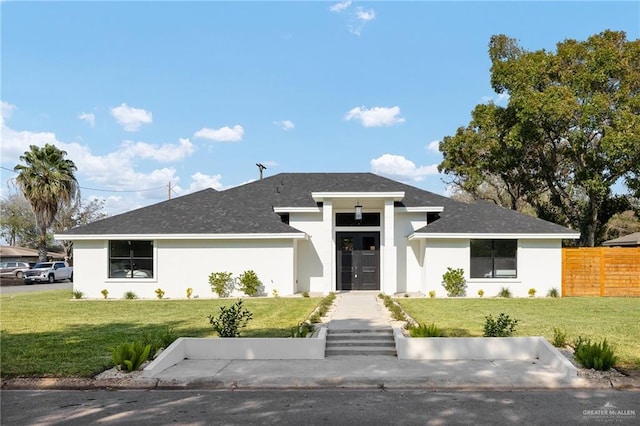 view of front of home featuring a front lawn