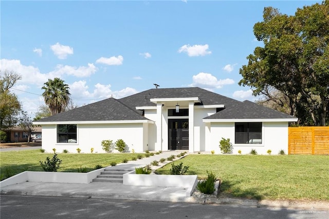 view of front of house featuring a front lawn